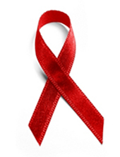 Le fameux ruban rouge, grand symbole de la mobilisation contre le VIH.