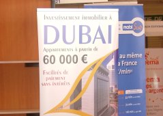 Affiche vantant l'investissement immobilier à Dubaï
