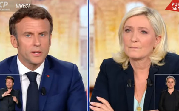 « Guerre civile » : vif débat entre Le Pen et Macron autour du voile